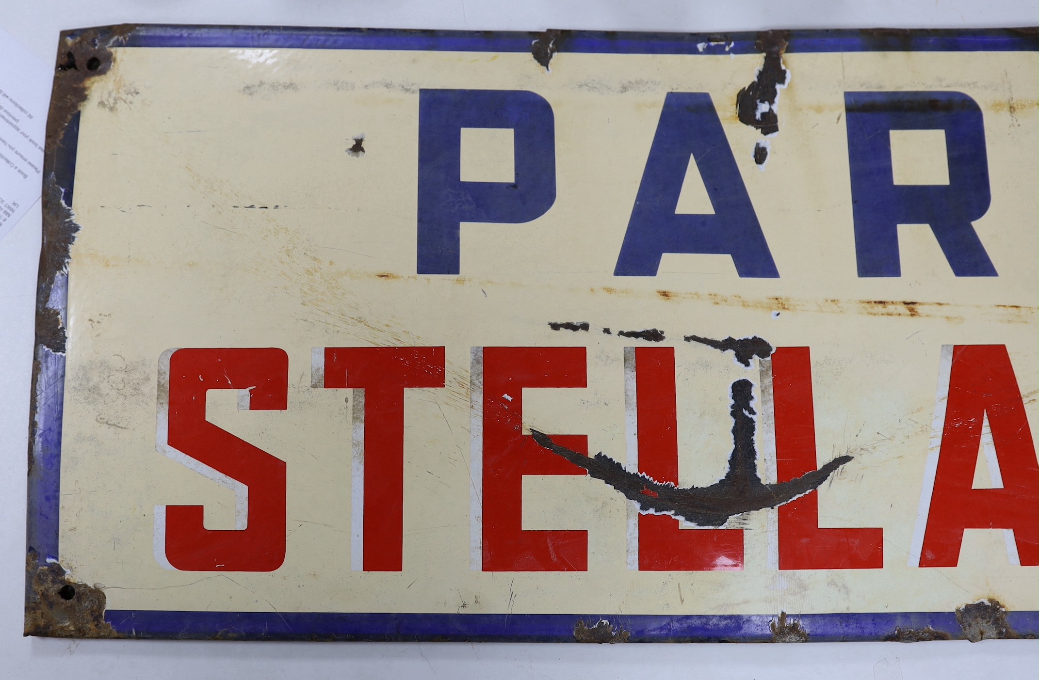 A Stella Artois ‘parking’ enamel sign. 44 x 148cm
